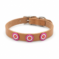 Pink on Tan beaded leather dog collar on a white background, three pink and white beaded rosettes on a slim tan band