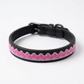 Pink on Black beaded leather dog collar on a white background, bright pink beaded zigzag along a slim black band