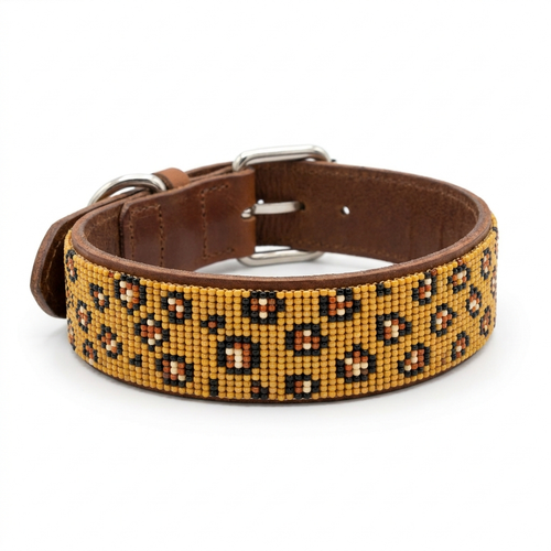 Cheetah Print beaded leather dog collar on a white background, wide band fully covered in golden yellow beadwork with black and rust spots